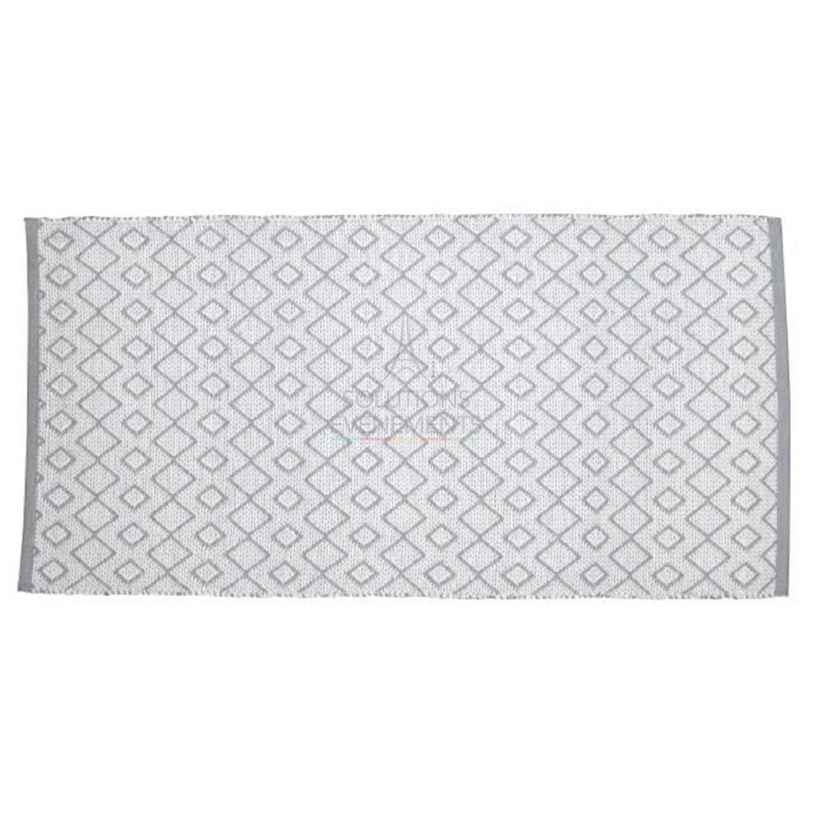 Rental of reversible gray rug with geometric pattern