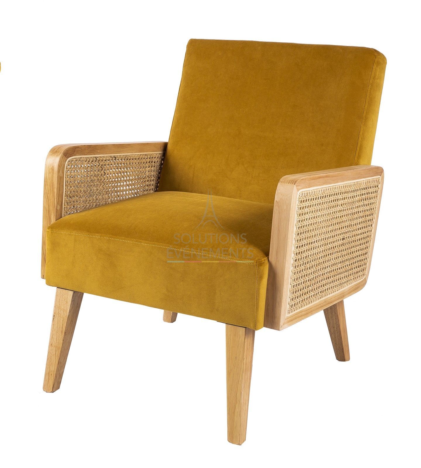 Mustard yellow velvet armchair rental with bohemian rattan canework